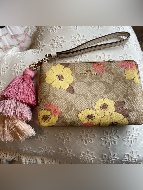 Coach Handbags - Coach Floral Signature Wristlet in Yellow & Pink